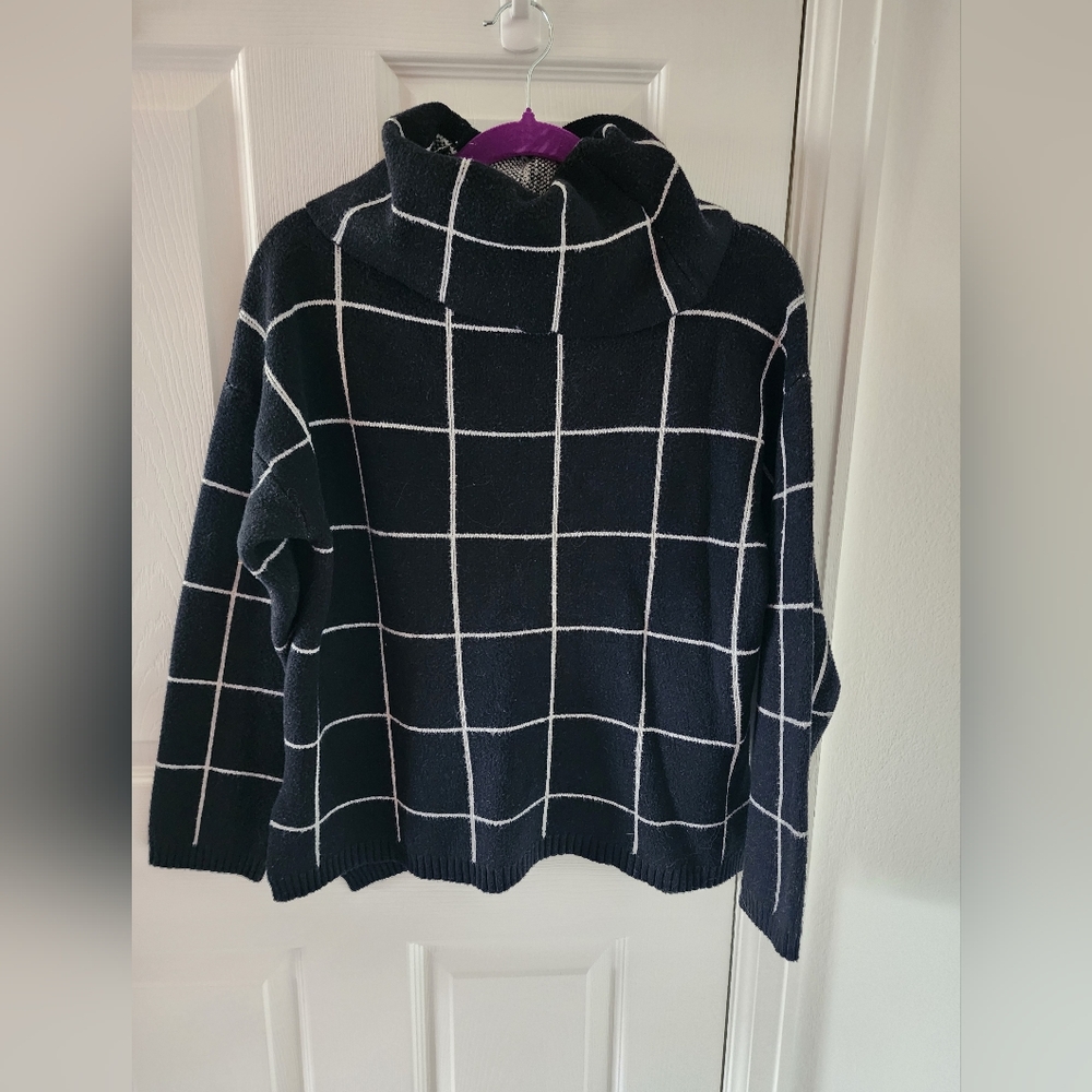 Elegant Black and White Checkered Turtleneck Sweater
